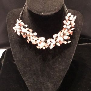 Artisan created choker. Wire and chunks of stone.